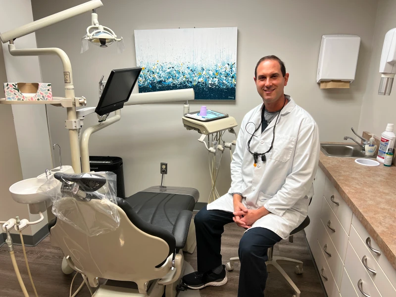 Dr Klein sitting in his office
